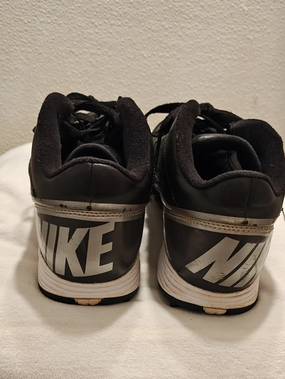 Nike Youth Black and White Athletic Football Cleats